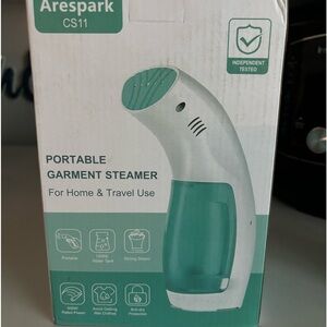Handheld steamer